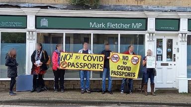 Protesters gathered outside Mark Fletcher's office